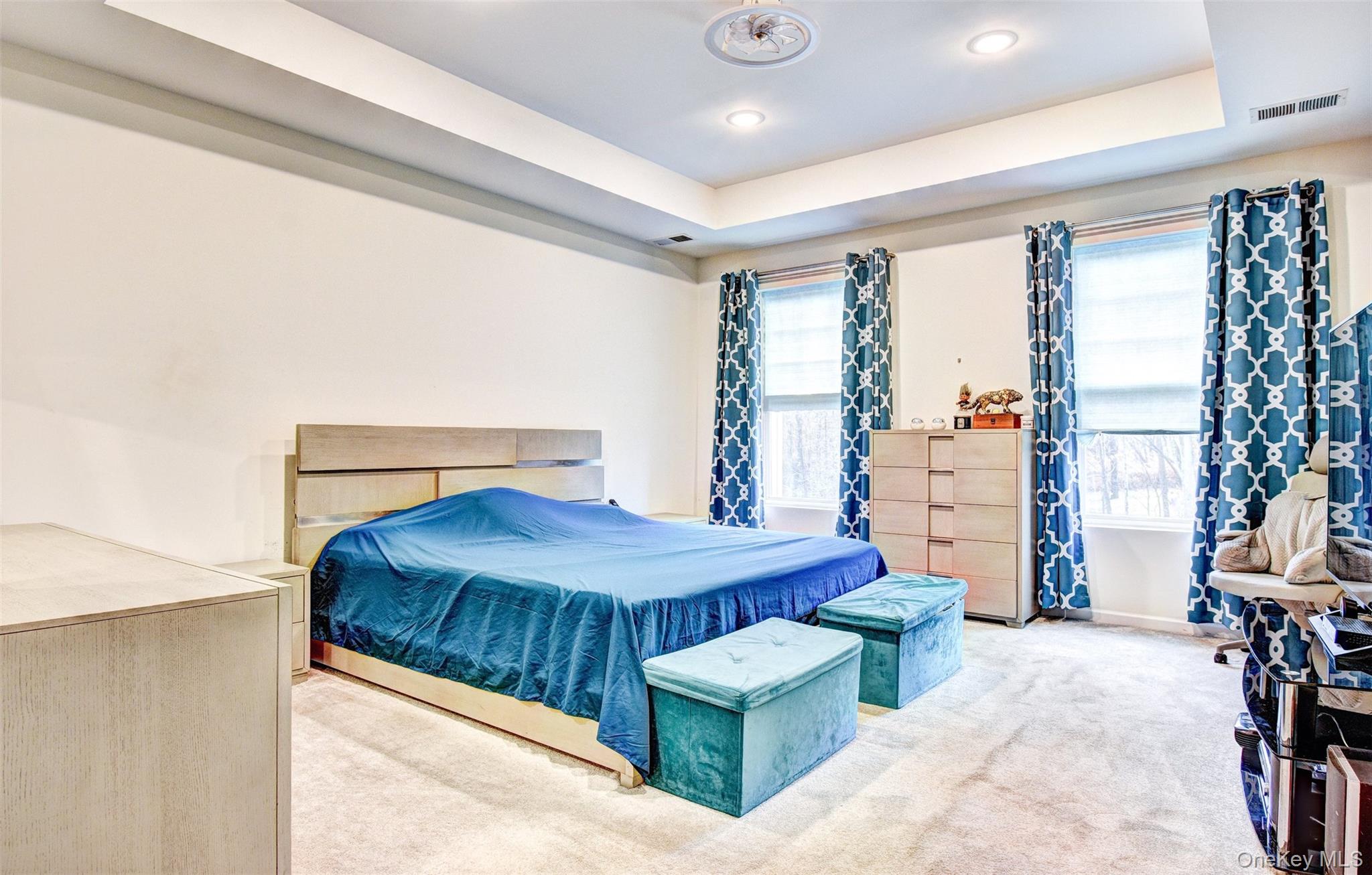 17 Magnolia Park Road Middletown, NY 10940 - Photo 15 of 35 a bedroom with a bed and large windows