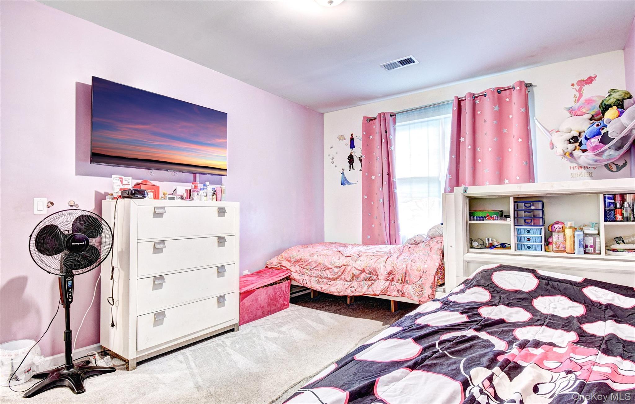 17 Magnolia Park Road Middletown, NY 10940 - Photo 21 of 35 a bedroom with furniture and a window