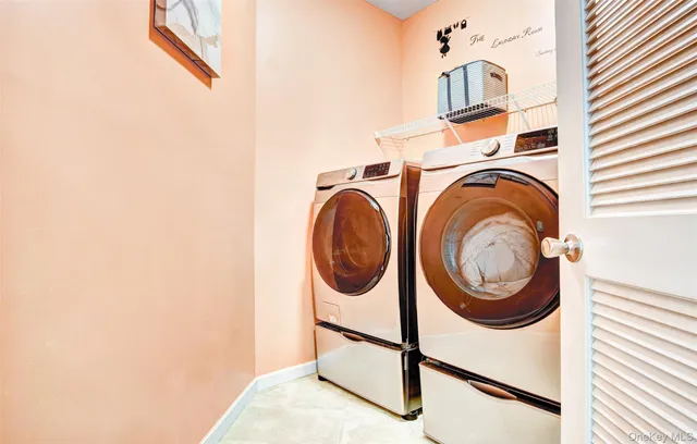 a view of a hallway with wooden floor and workspace