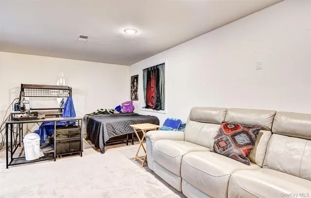 a living room with furniture and a couch