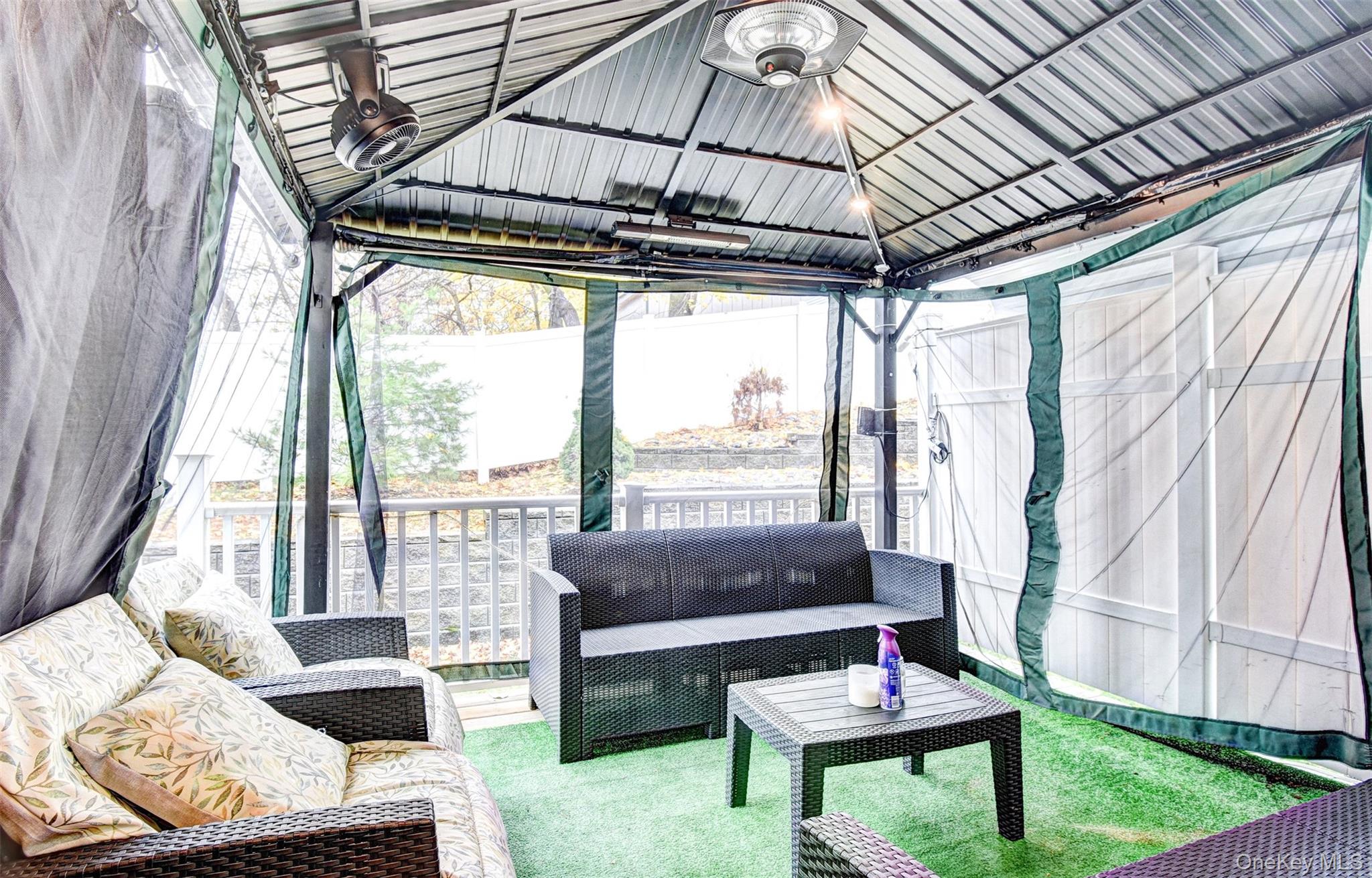 17 Magnolia Park Road Middletown, NY 10940 - Photo 28 of 35 a living room with furniture and a floor to ceiling window