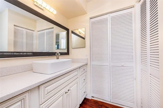 a bathroom with a shower and toilet