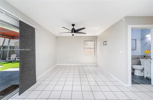 a view of an empty room and fire place
