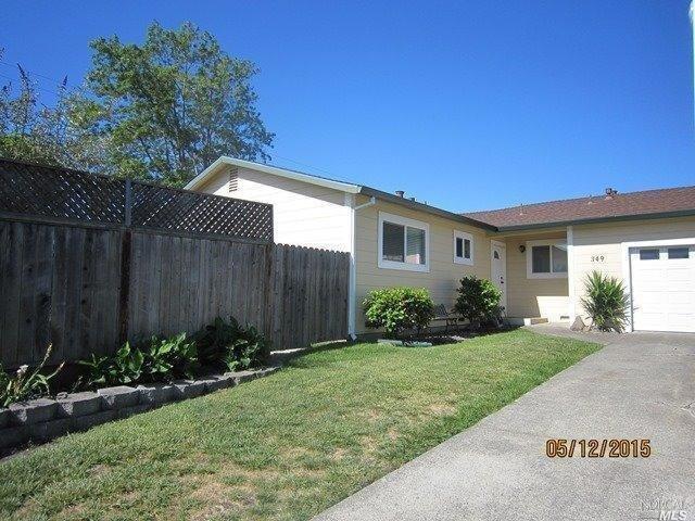 From drive-way to house.  Manicured landscaping, side access into yard through gate, Composite Lap Siding that has been insulated, and shear walled with 5/8 inch plywood. This house has been updated to last!!