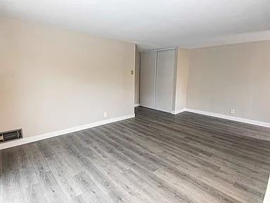 1091 Reed Avenue, Unit D Sunnyvale, CA 94086 - Photo 6 of 11 a view of an empty room with wooden floor