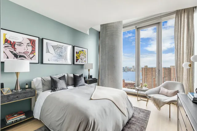 a bathroom with a granite countertop sink mirror and vanity