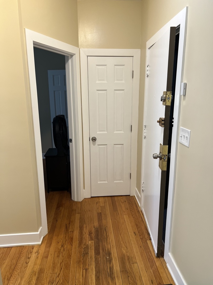 7506 South Vernon Avenue, Unit 3C Chicago, IL 60619 - Photo 9 of 10 wooden floor in a gallery