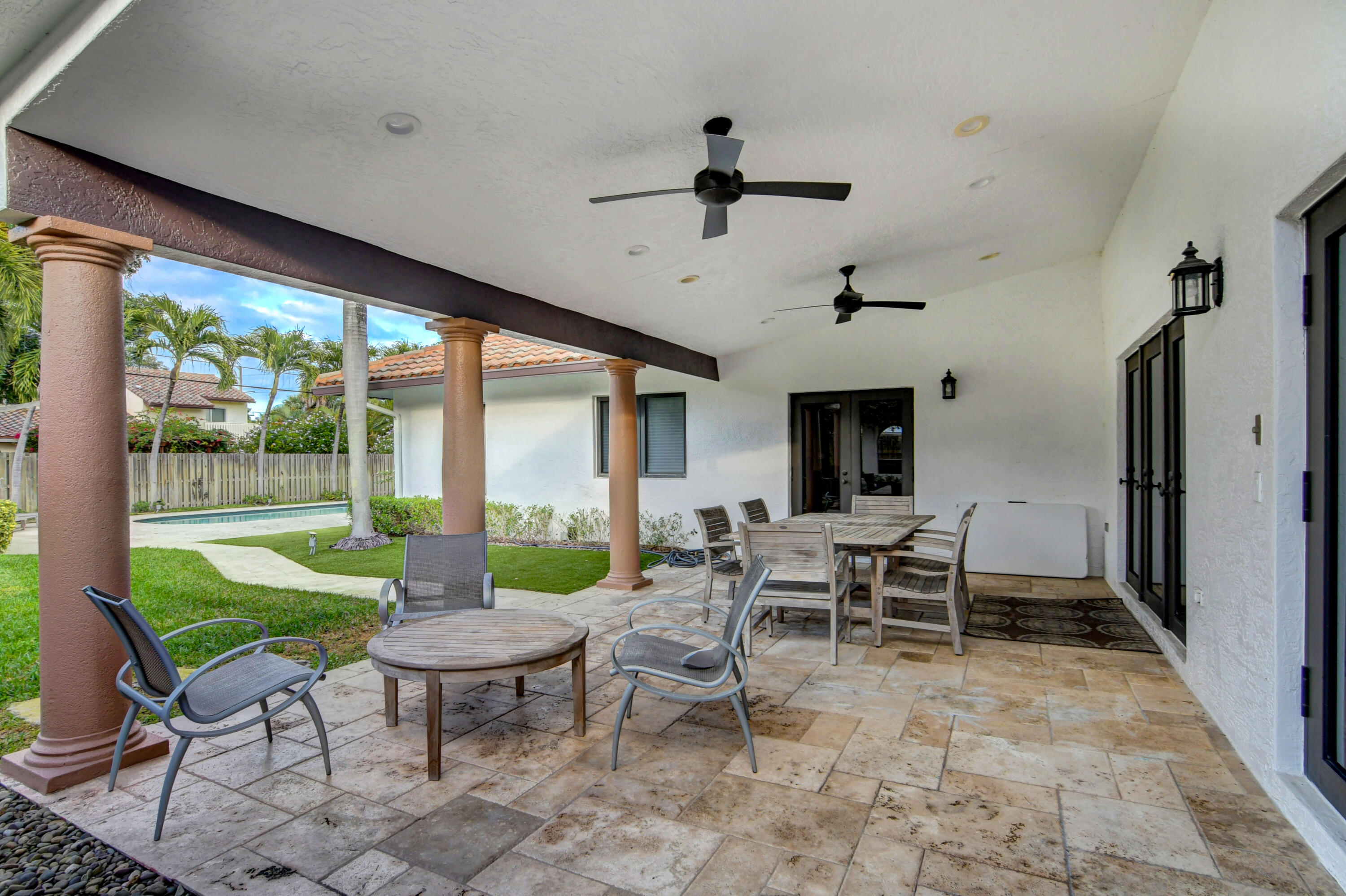 921 Southwest 20th Street Boca Raton, FL 33486 - Photo 49 of 56 a living room with furniture and a large window