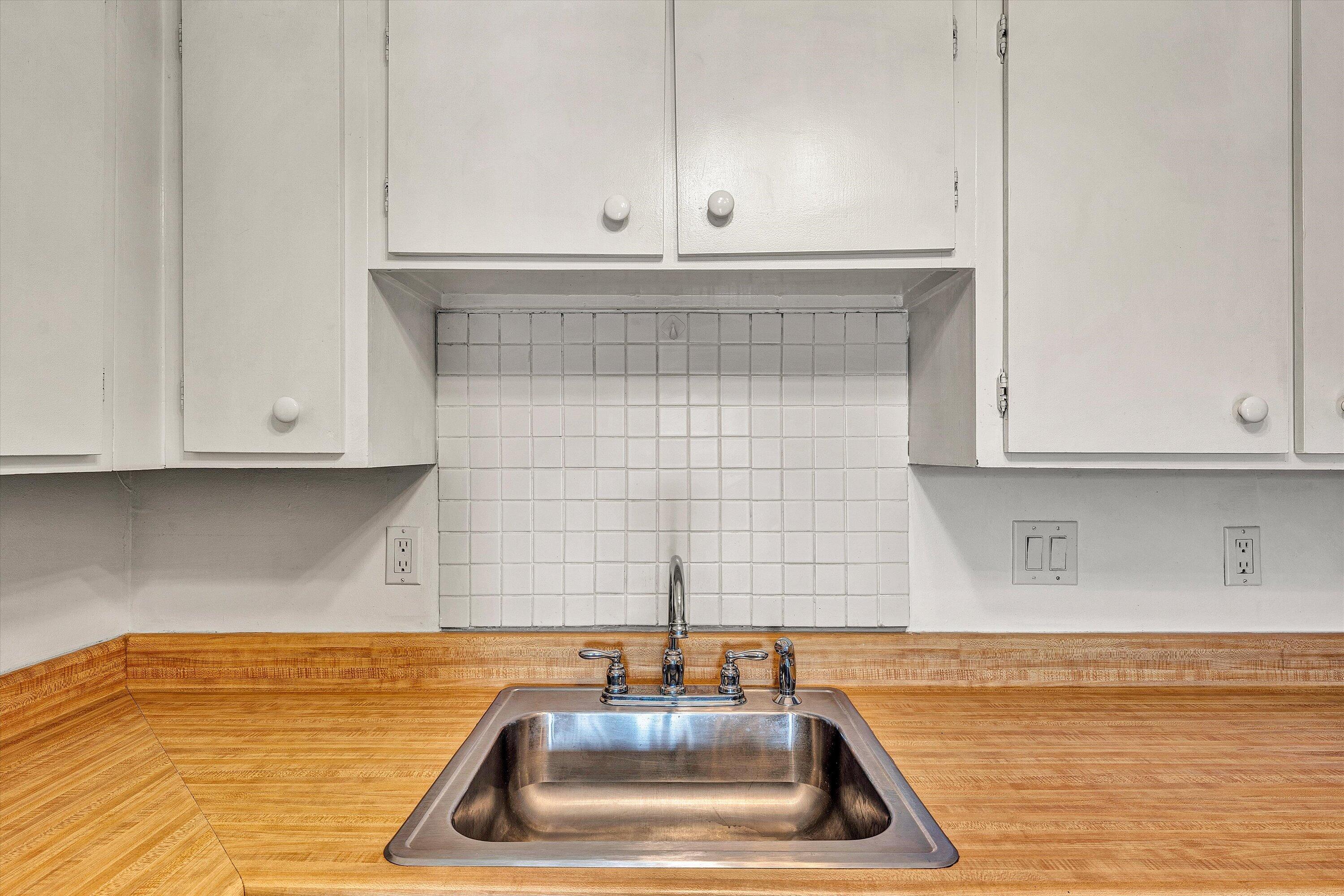 3554 Timberline Trail Roanoke, VA 24018 - Photo 13 of 20 a kitchen with washing machine and cabinets