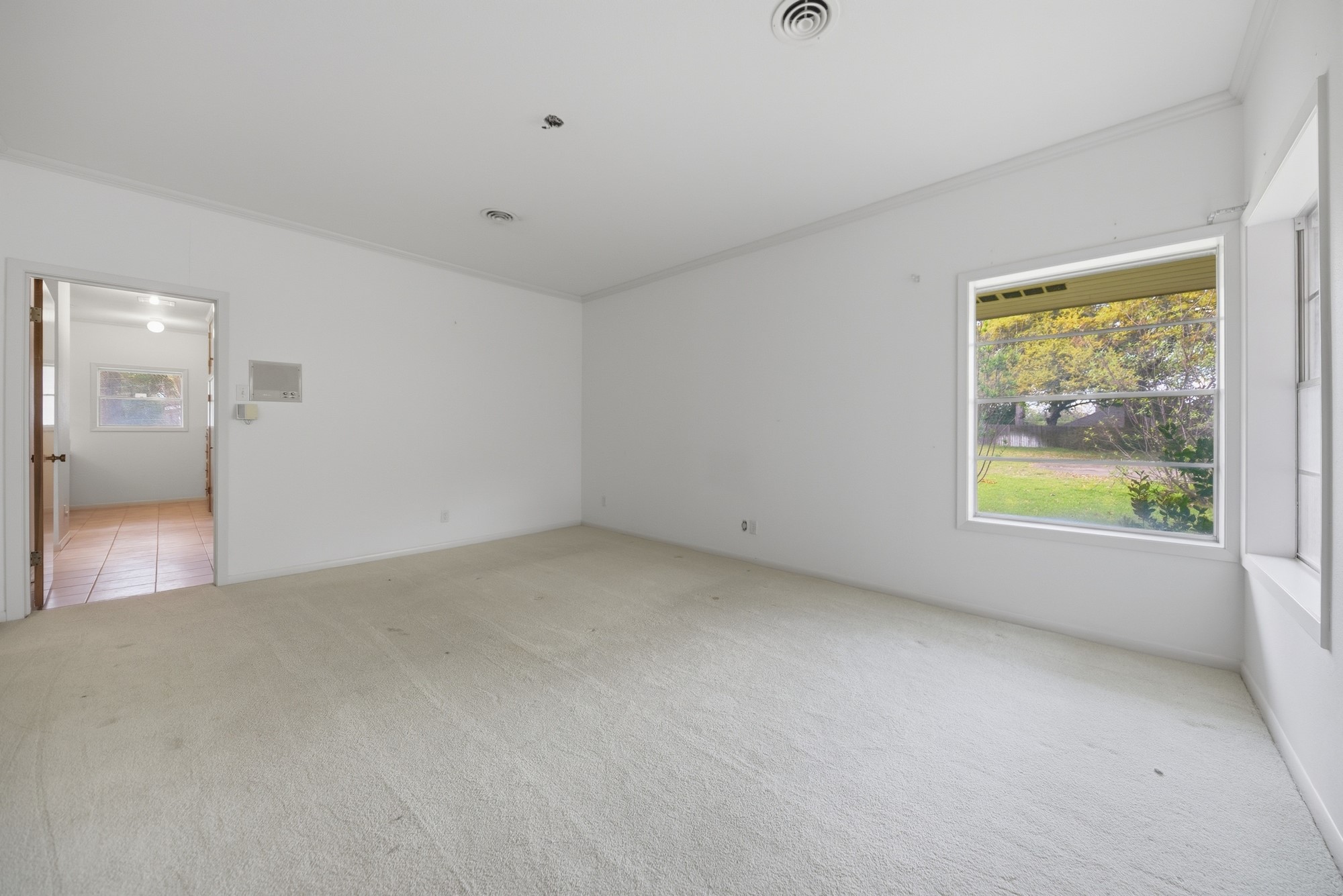 1500 Key Street Brenham, TX 77833 - Photo 25 of 41 a view of an empty room with a window