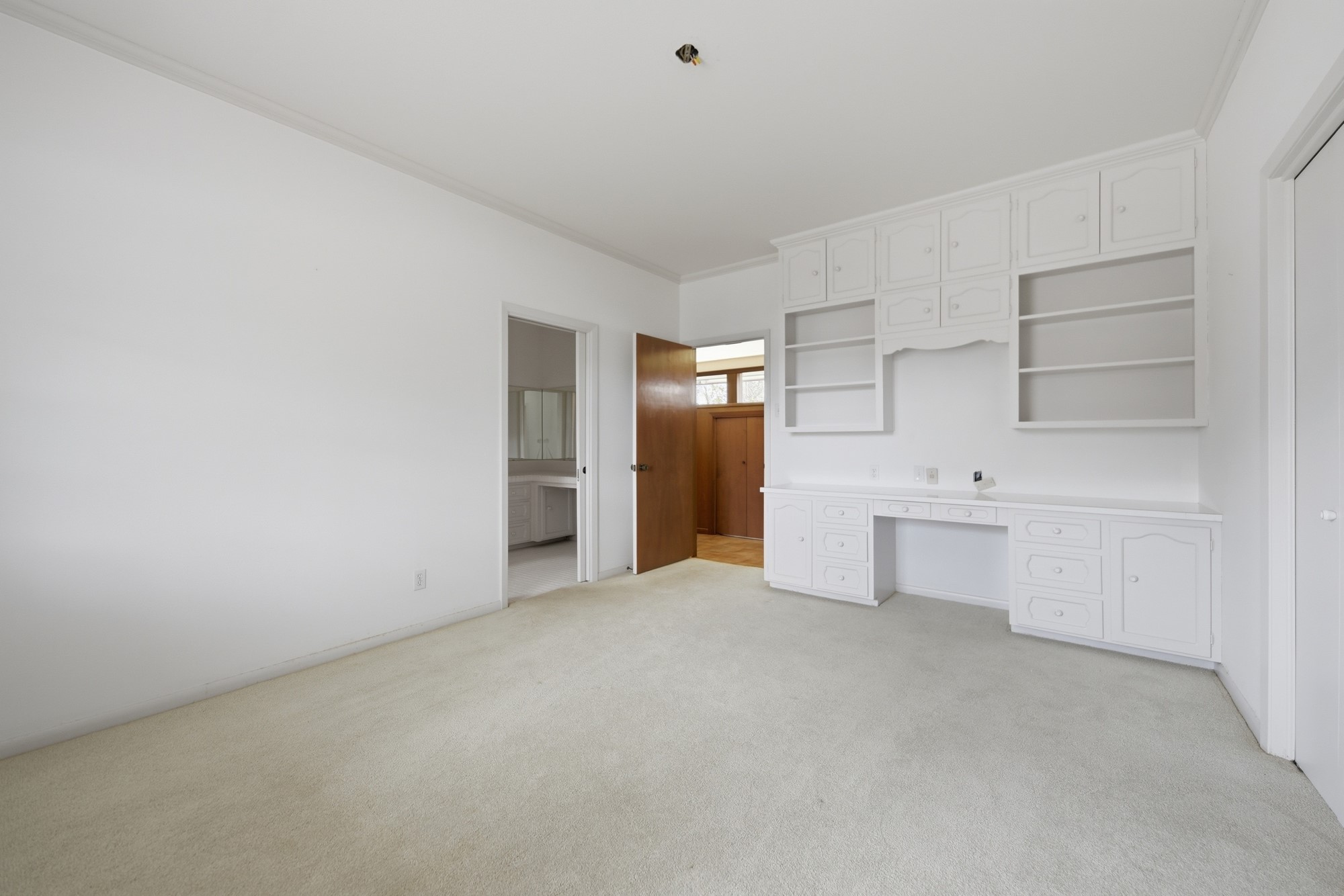 1500 Key Street Brenham, TX 77833 - Photo 32 of 41 a view of an empty room with closet and cabinet