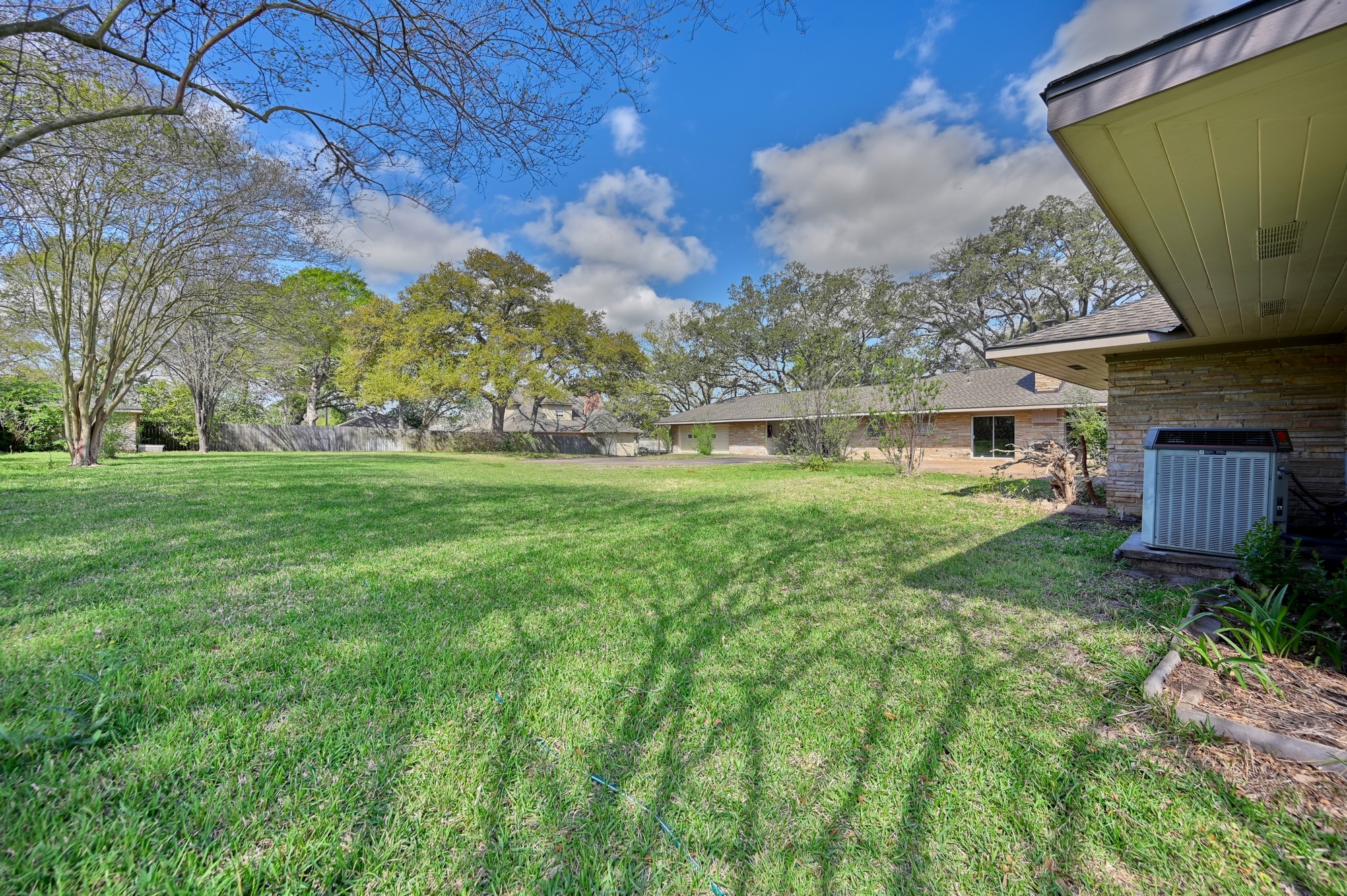 1500 Key Street Brenham, TX 77833 - Photo 39 of 41 a backyard of a house with table and chairs