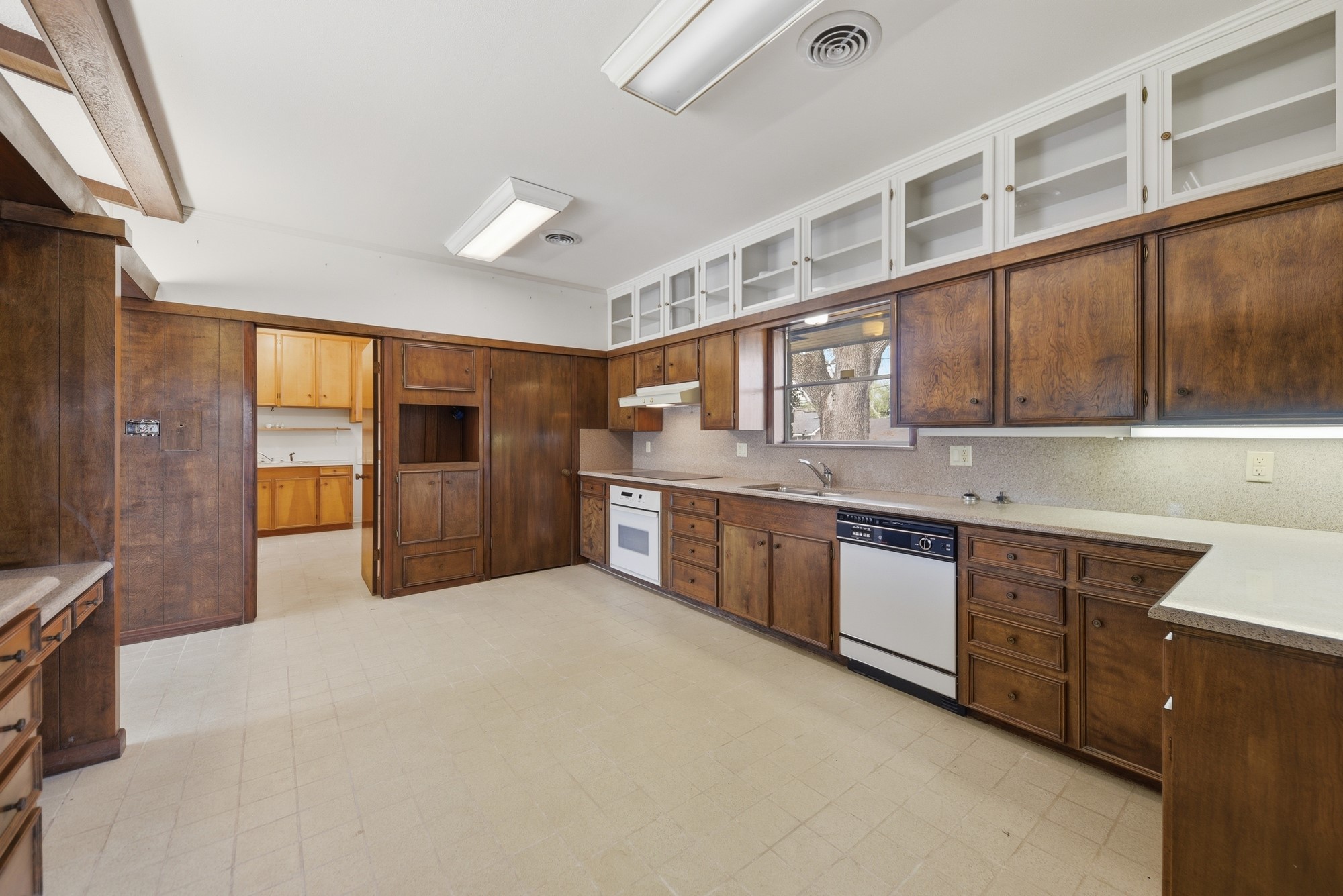 1500 Key Street Brenham, TX 77833 - Photo 4 of 41 a large kitchen with stainless steel appliances granite countertop a stove and large cabinets