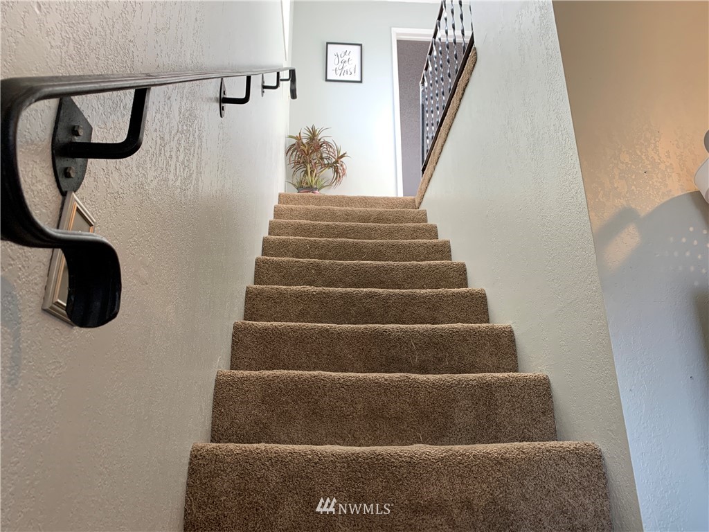 353 Maringo Road Ephrata, WA 98823 - Photo 11 of 20 a view of staircase with wooden floor
