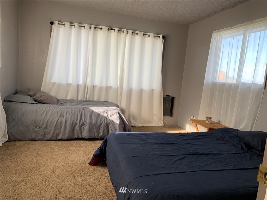 353 Maringo Road Ephrata, WA 98823 - Photo 12 of 20 a bedroom with a bed and window