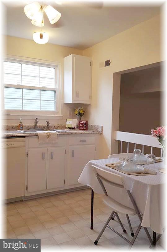 5311 Balistan Road Baltimore, MD 21237 - Photo 14 of 30 Kitchen offers abundant table space.