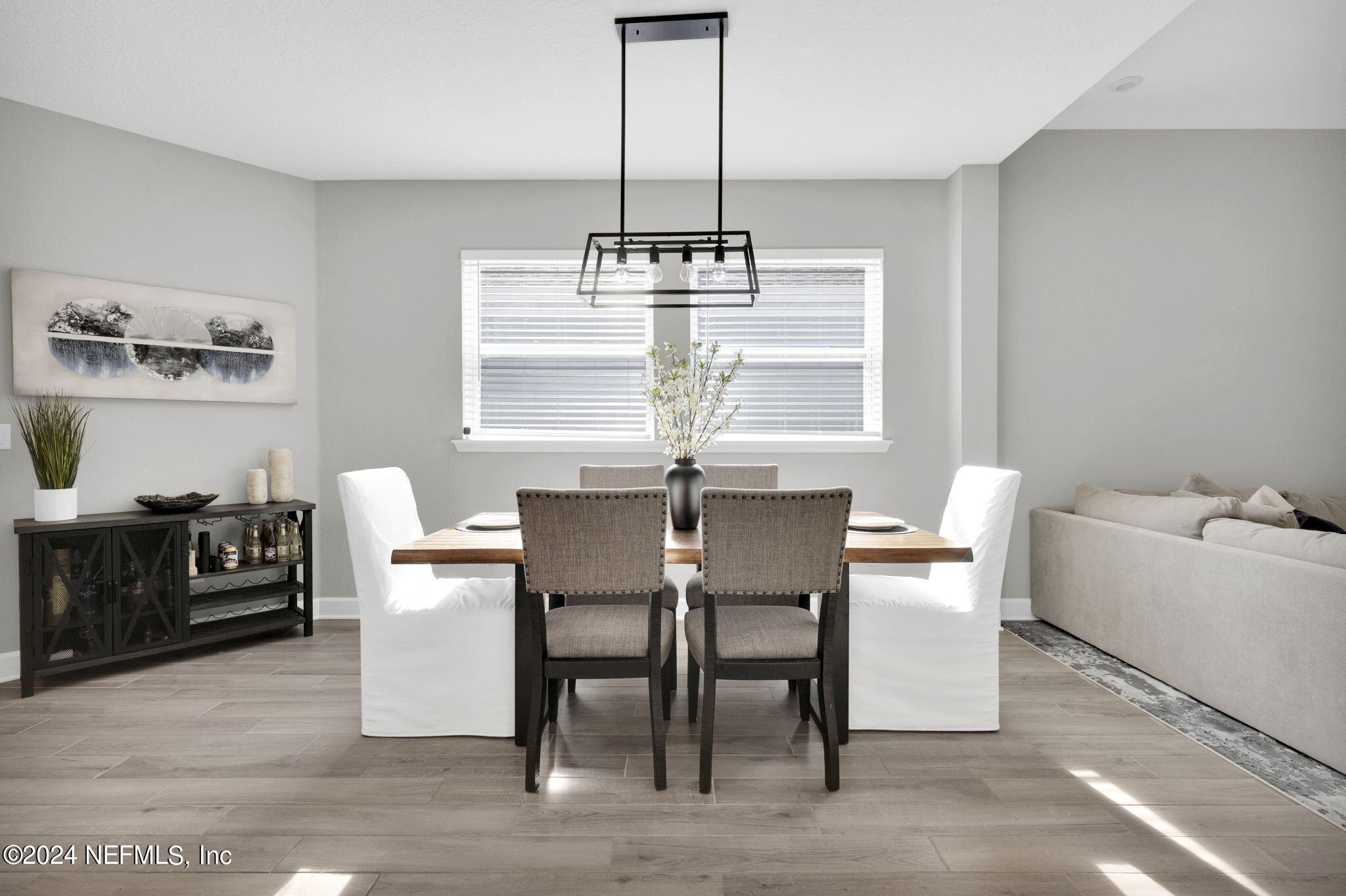 175 Windswept Way Street St. Augustine, FL 32092 - Photo 11 of 80 a view of a dining room with furniture window and wooden floor