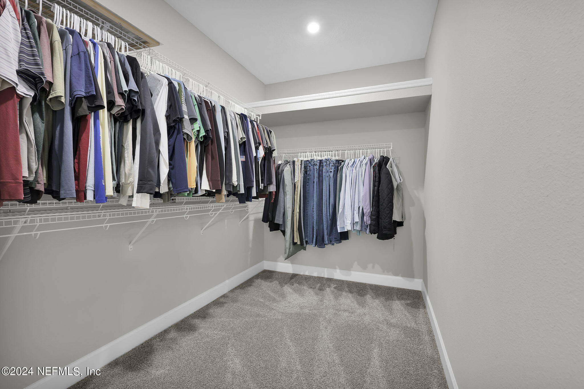 175 Windswept Way Street St. Augustine, FL 32092 - Photo 21 of 80 a view of walk in closet with clothes