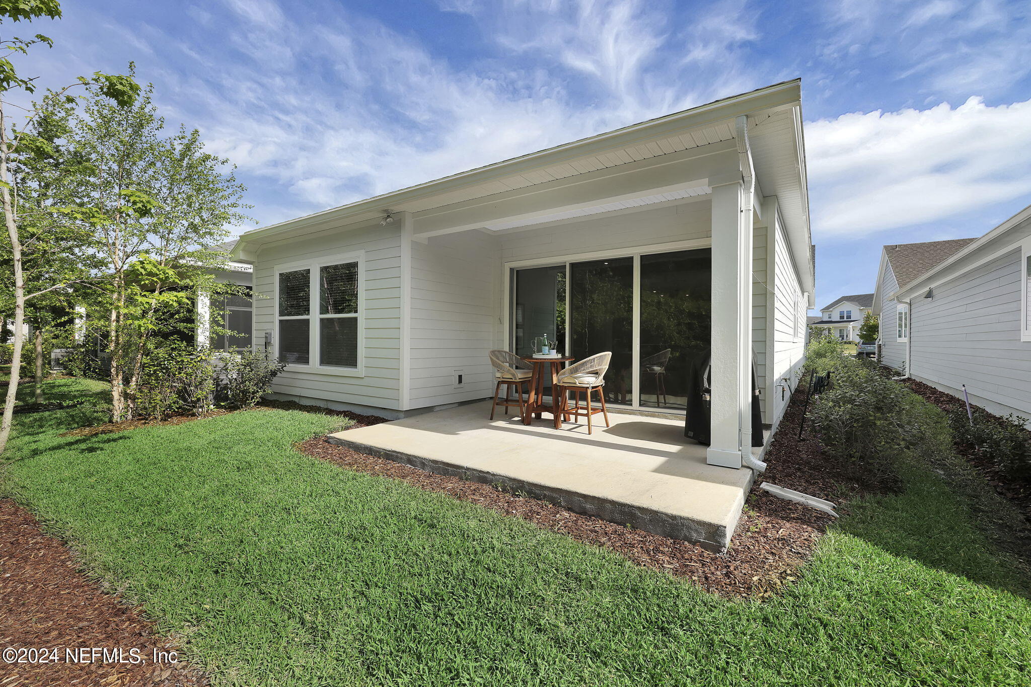175 Windswept Way Street St. Augustine, FL 32092 - Photo 27 of 80 a view of back yard of the house