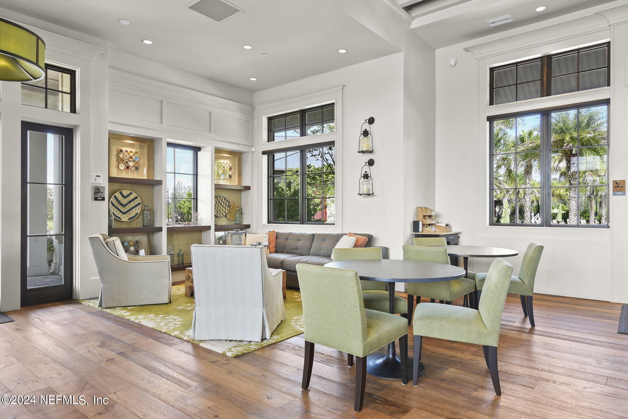 175 Windswept Way Street St. Augustine, FL 32092 - Photo 44 of 80 a view of a dining room with furniture windows and wooden floor