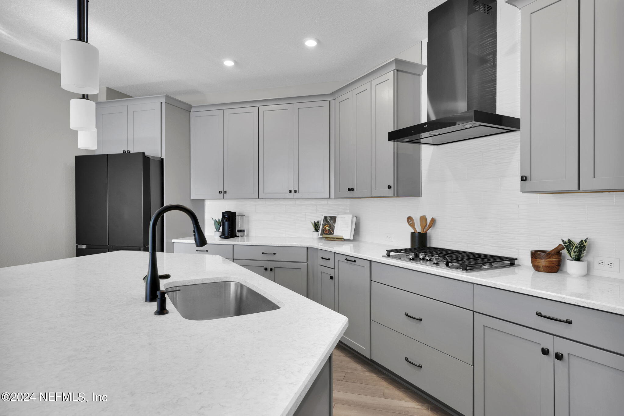 175 Windswept Way Street St. Augustine, FL 32092 - Photo 9 of 80 a kitchen with cabinets a sink and appliances