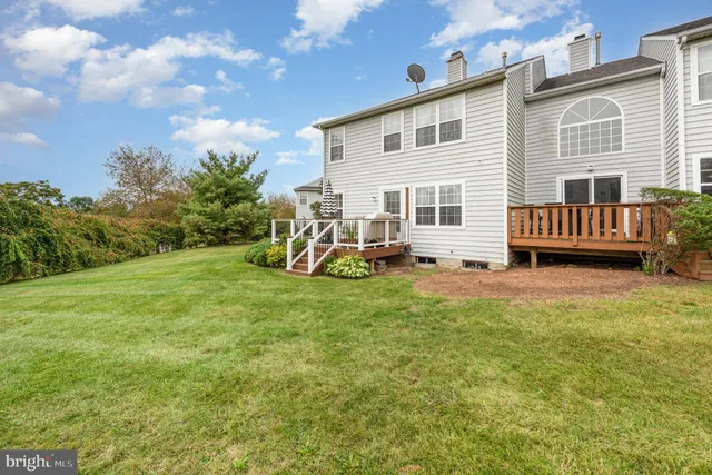 an aerial view of residential house with outdoor space