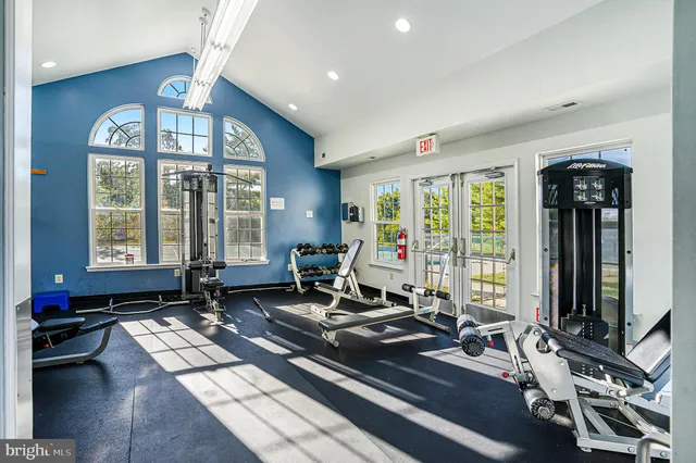 a view of a swimming pool with an outdoor space and seating area