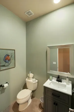 a bedroom with a bed and a couch