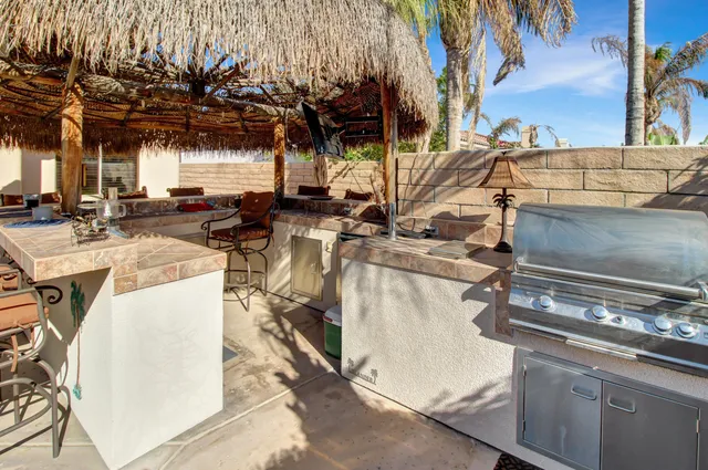 a utility room with a sink a washer and dryer