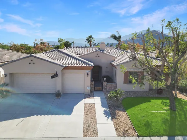 a view of balcony with wooden floor