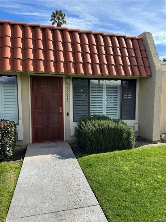 a front view of a house having yard