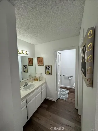 a spacious bathroom with a double vanity sink and a mirror
