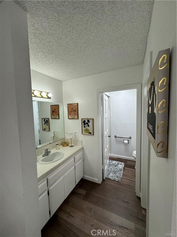 69520 Huerta Court Rancho Mirage, CA 92270 - Photo 18 of 25 a spacious bathroom with a double vanity sink and a mirror