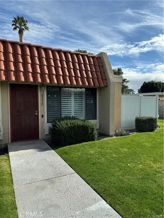 a front view of a house having yard
