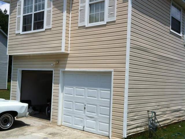 2725 Rambling Way Lithonia, GA 30058 - Photo 1 of 1 a view of a house with a small white door