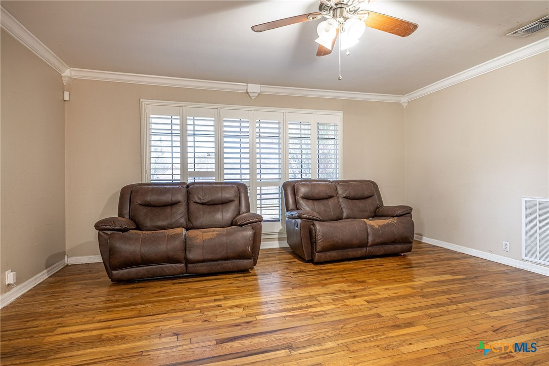 743 Royal Road Port Lavaca, TX 77979 - Photo 5 of 21 a living room with furniture and a large window