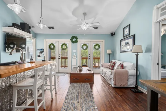 a kitchen with stainless steel appliances granite countertop a stove and cabinets