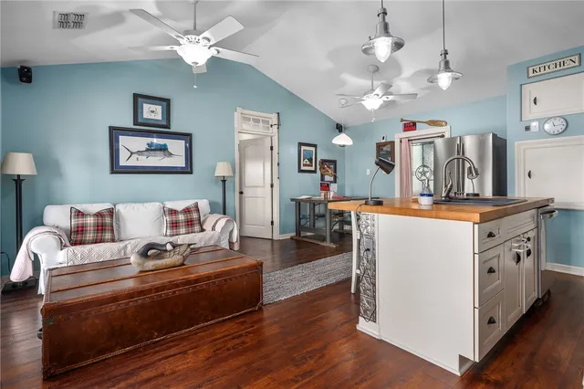 a bedroom with a bed and a window dresser