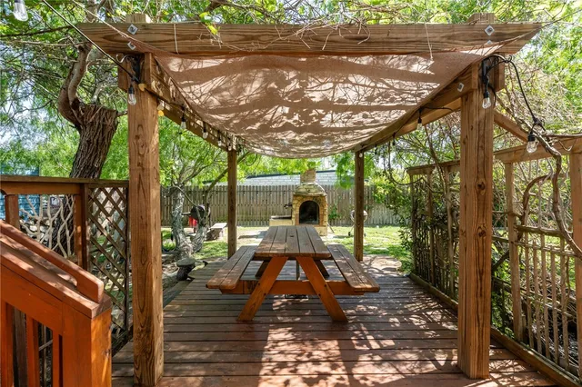 a view of yard with patio