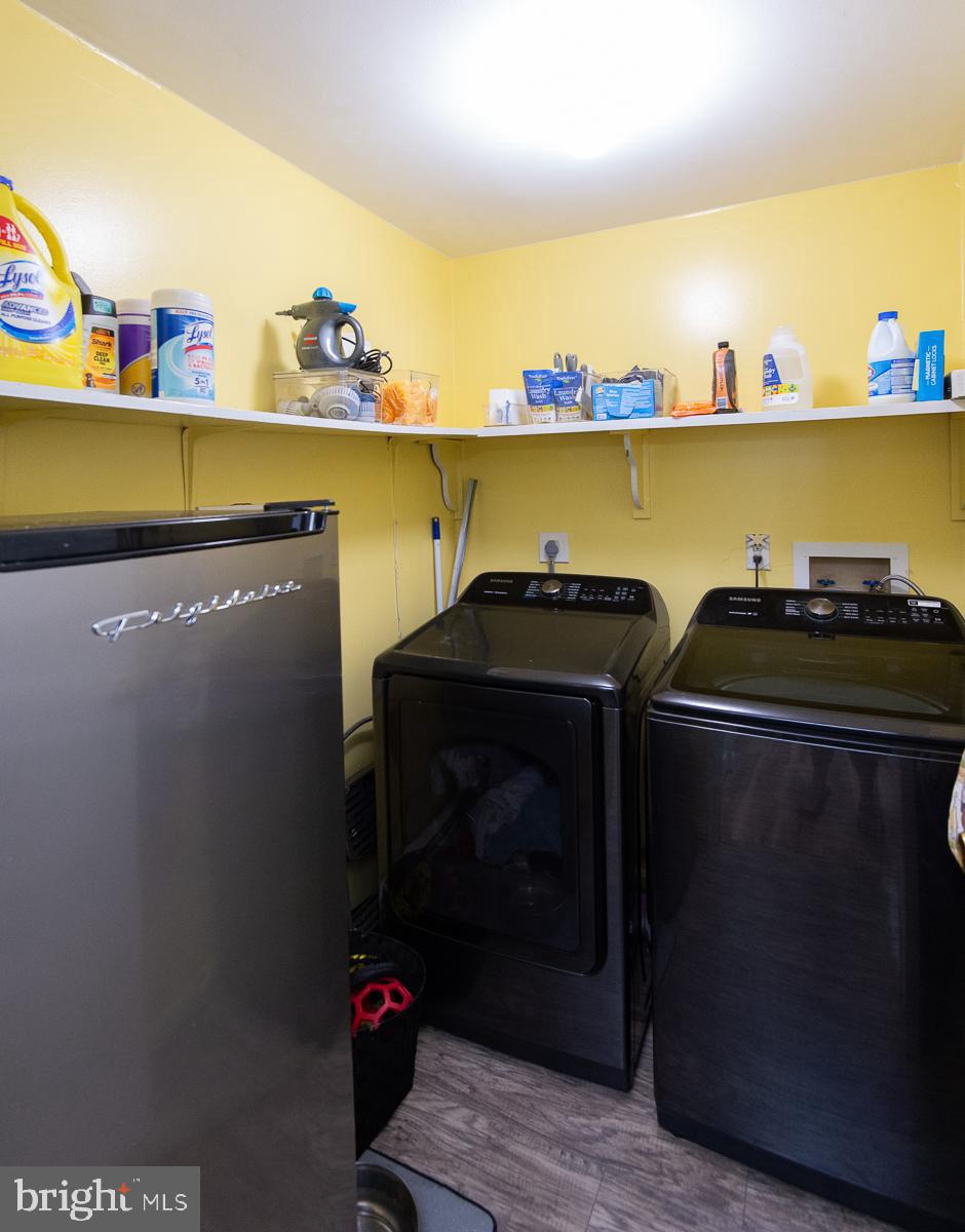 12 North Maple Avenue Ridgely, MD 21660 - Photo 27 of 30 a couple of chairs sitting in a kitchen next to a cabinet