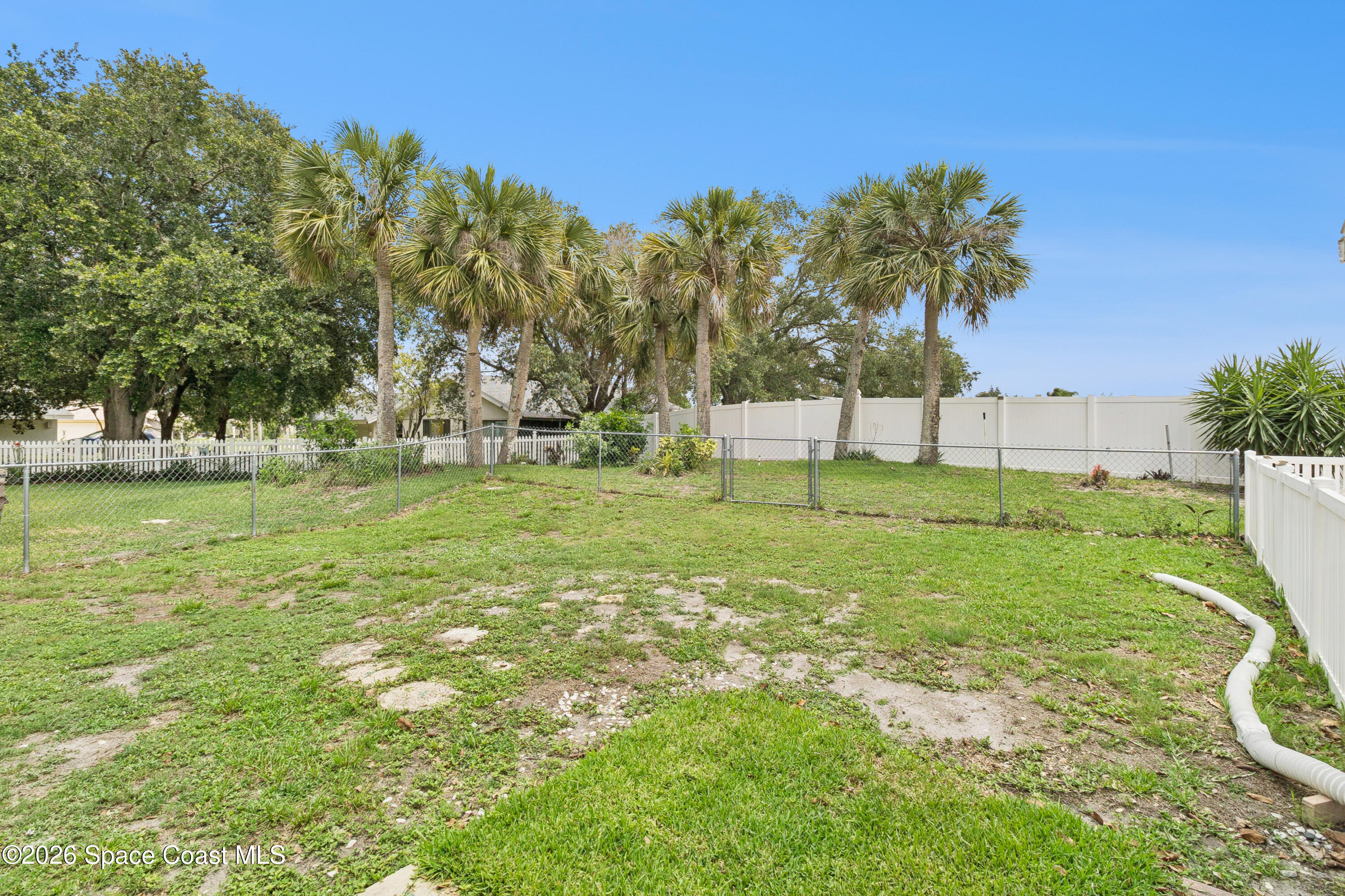 1334 Cherry Hills Road Northeast Palm Bay, FL 32905 - Photo 46 of 58 Back Yard/Dog Fenced Area