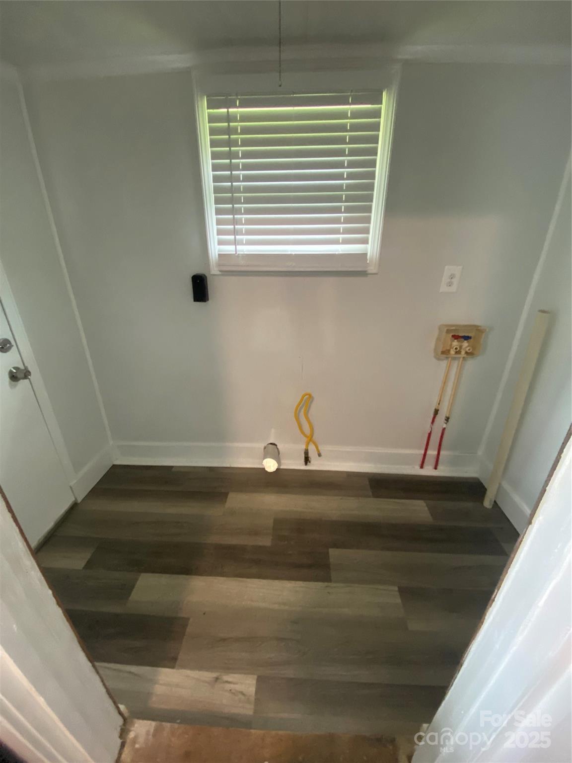 140 8th Street Winnsboro, SC 29180 - Photo 18 of 19 a bathroom with a sink and washing machine