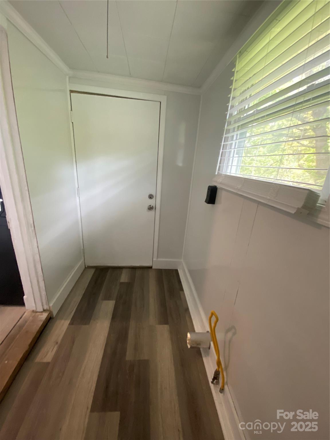 140 8th Street Winnsboro, SC 29180 - Photo 19 of 19 a view of a room with an empty space and a window