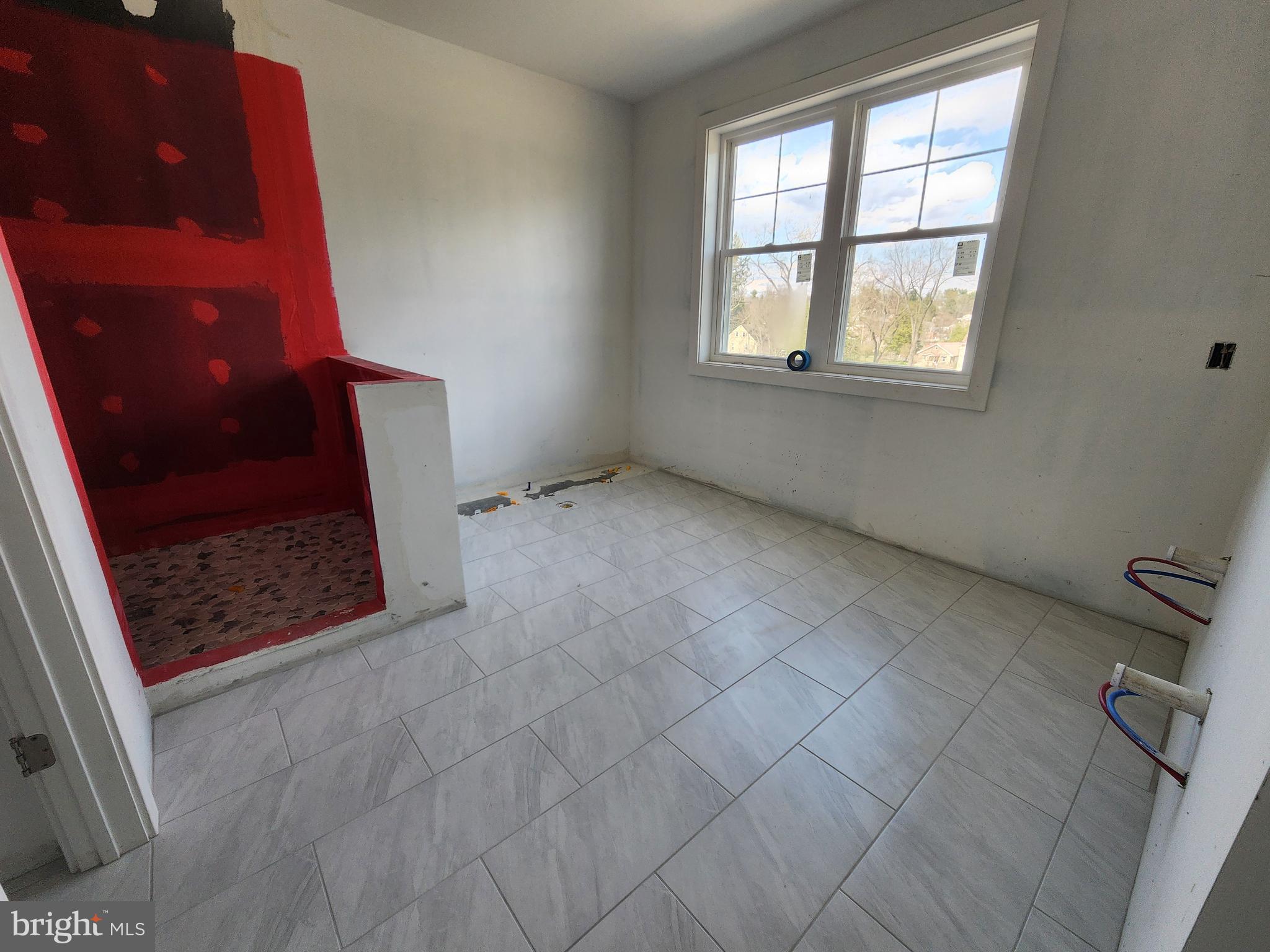324 Bishop Hollow Road Newtown Square, PA 19073 - Photo 11 of 22 an empty room with windows