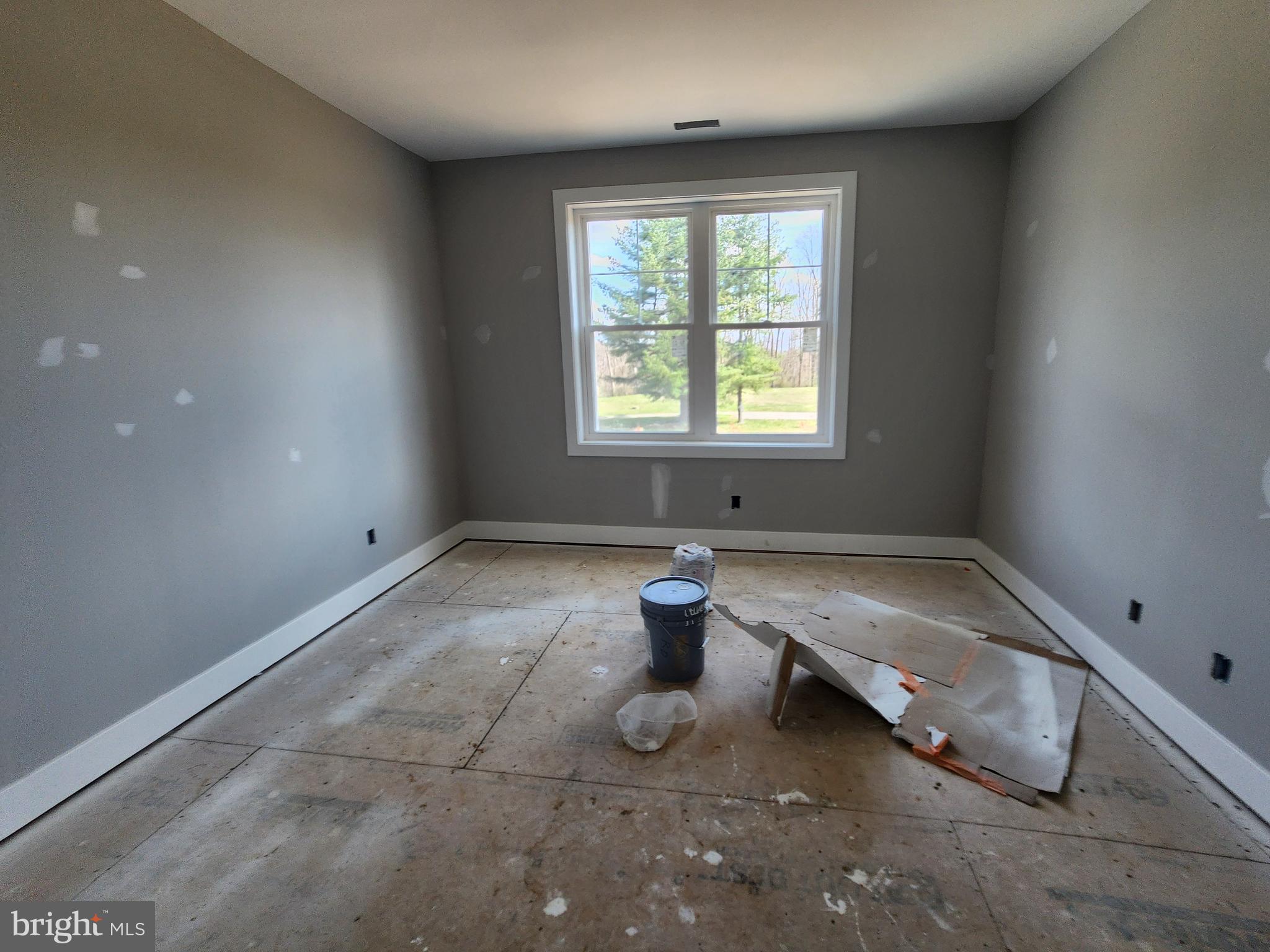 324 Bishop Hollow Road Newtown Square, PA 19073 - Photo 12 of 22 an empty room with shelves and windows
