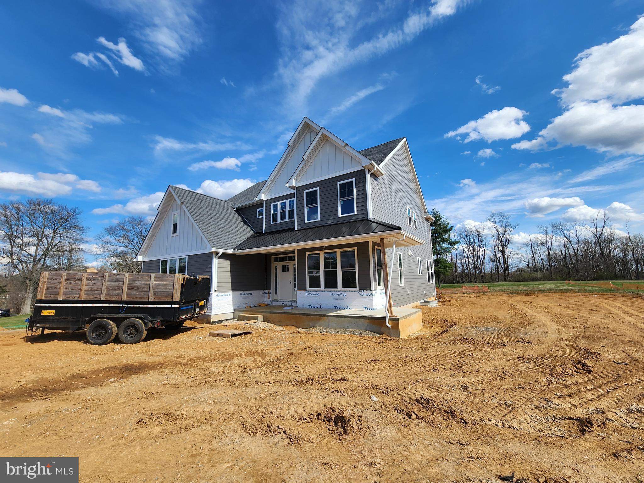 324 Bishop Hollow Road Newtown Square, PA 19073 - Photo 13 of 22 a view of a house with a yard covered in snow