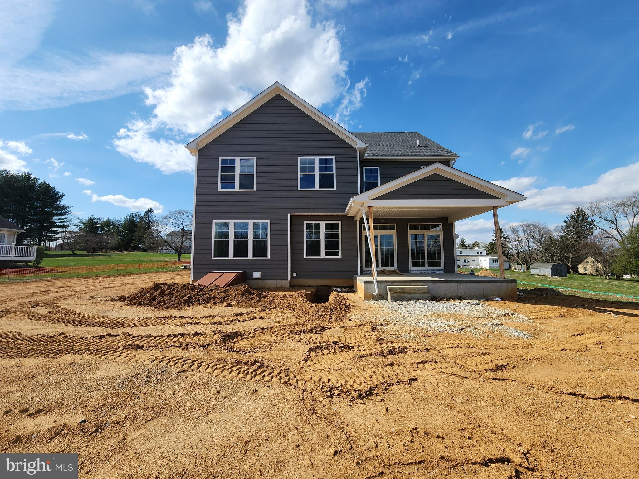 324 Bishop Hollow Road Newtown Square, PA 19073 - Photo 2 of 22 a front view of a house with a yard