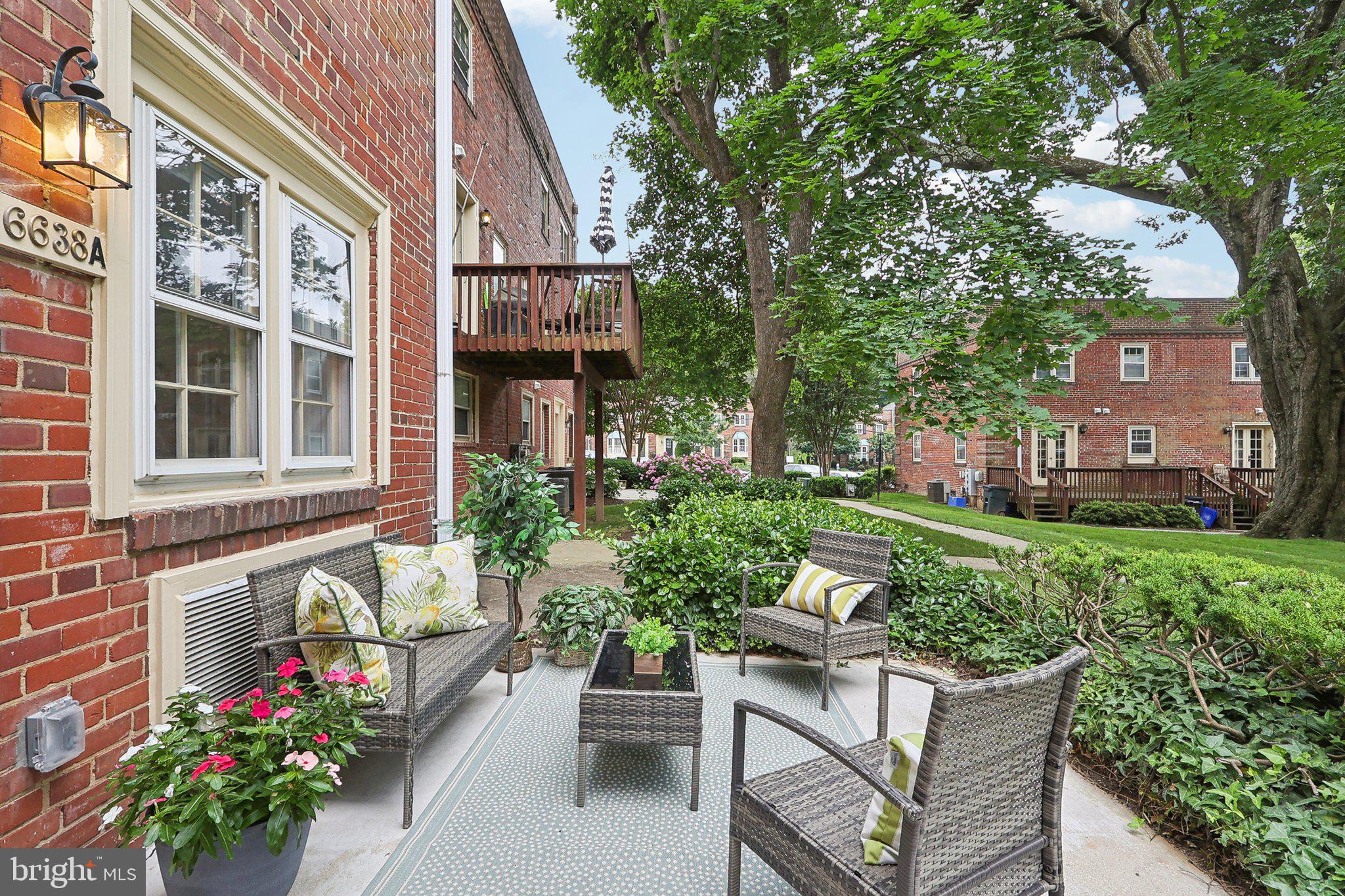 6638 A Hillandale Road, Unit 53A Chevy Chase, MD 20815 - Photo 13 of 26 a view of a house with a backyard and sitting area