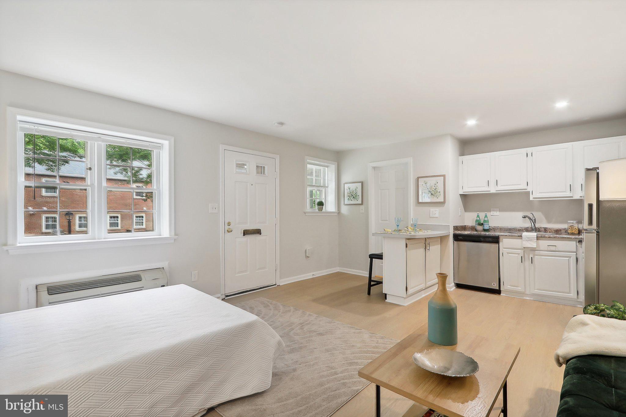 6638 A Hillandale Road, Unit 53A Chevy Chase, MD 20815 - Photo 9 of 26 a spacious bedroom with a bed and furniture