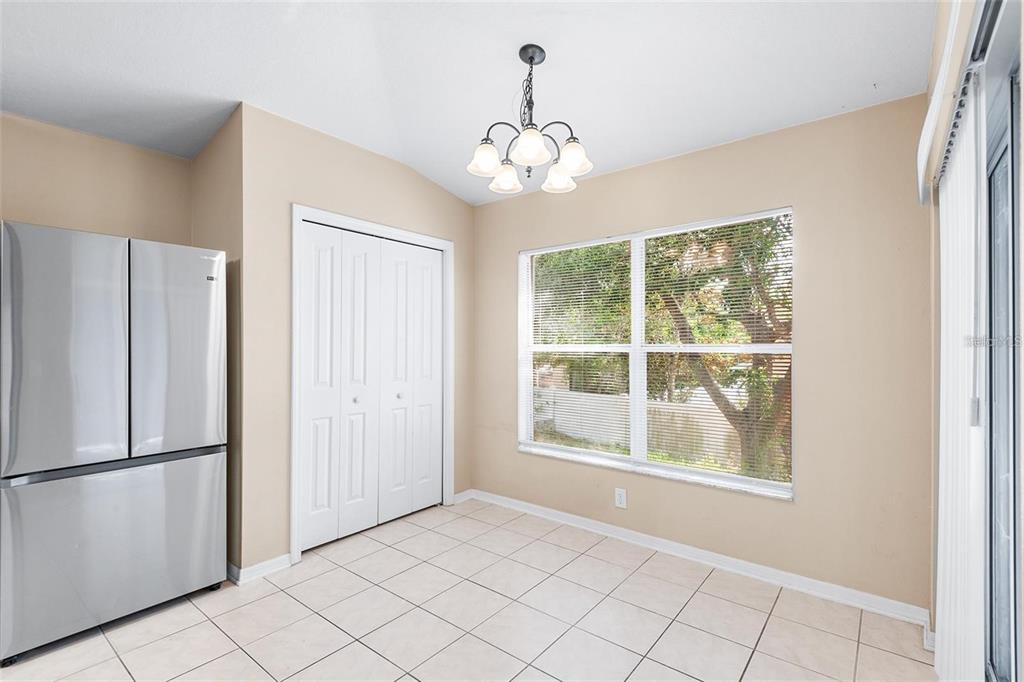 3483 Beaumont Loop Spring Hill, FL 34609 - Photo 6 of 14 a view of an empty room with a window